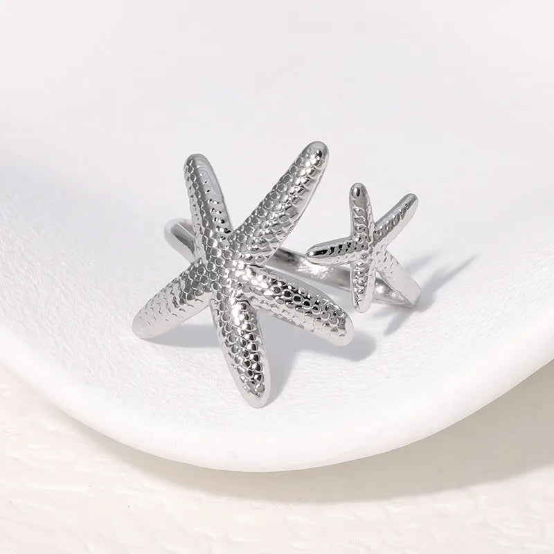 Anillo estrellas plateado
