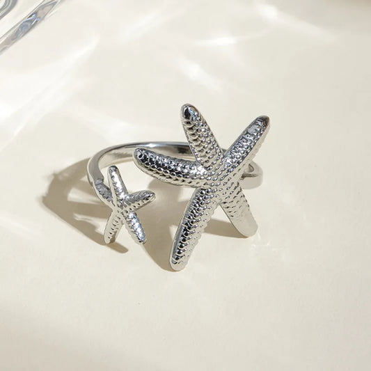 Anillo estrellas plateado